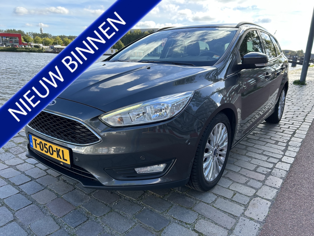Ford Focus Wagon - 1.0 Titanium navigatie airco/ecc keurige auto - AutoWereld.nl