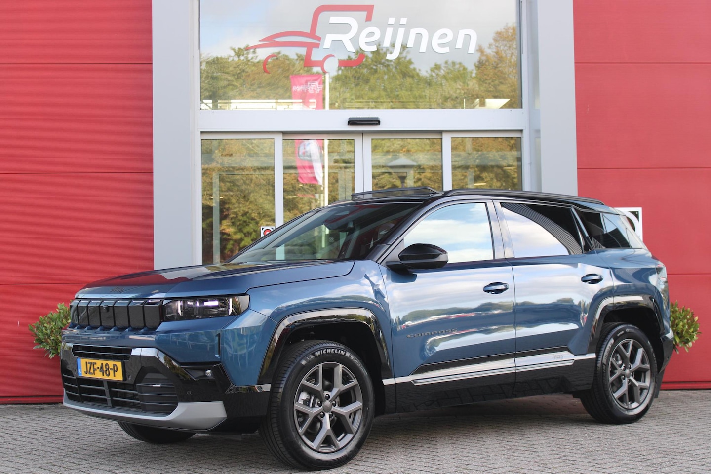 Jeep Compass - 1.2 145PK e-Hybrid FIRST EDITION | PANORAMADAK: TWEEDELIG PANORAMISCH SCHUIF-/KANTELDAK | - AutoWereld.nl