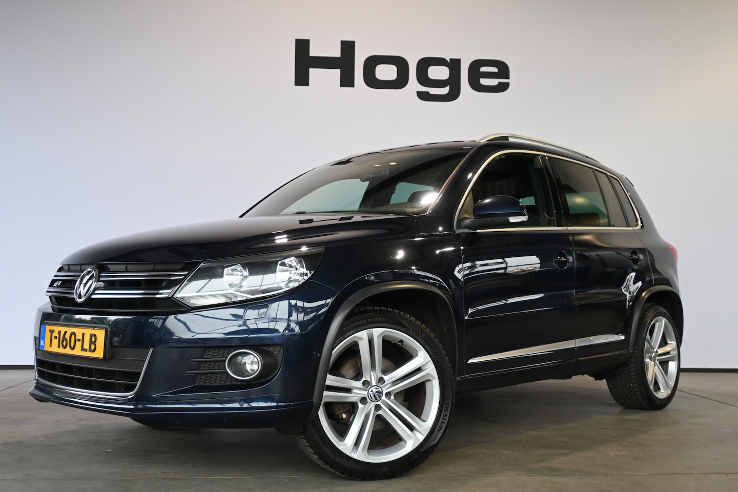 Volkswagen Tiguan - 1.4 TSI Sport&Style 4Motion R-line Edition Clima Navigatie Stoelverwarming Goed Onderhoude - AutoWereld.nl