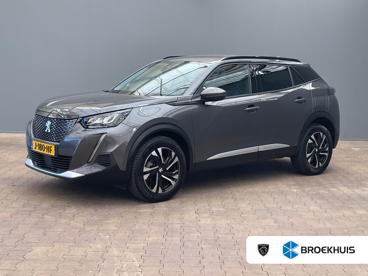 Peugeot 2008 - 1.2 PureTech Allure | Achterbank in delen neerklapbaar | Achteruitrijcamera | Airco (autom - AutoWereld.nl