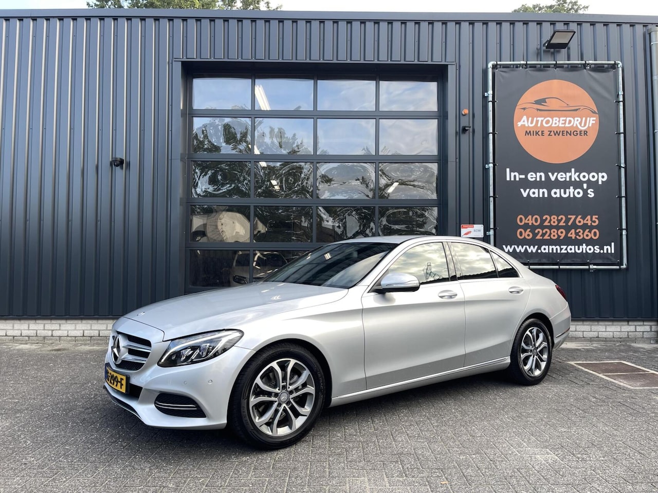 Mercedes-Benz C-klasse - 180 AUT. NAVIGATIE|STOELVERWARMING|ORIGINEEL NL|PRACHTIGE STAAT - AutoWereld.nl