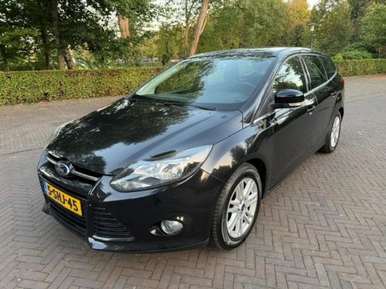 Ford Focus Wagon - 1.0 EcoBoost Titanium/Trekhaak/Navi/PDC/APK - AutoWereld.nl
