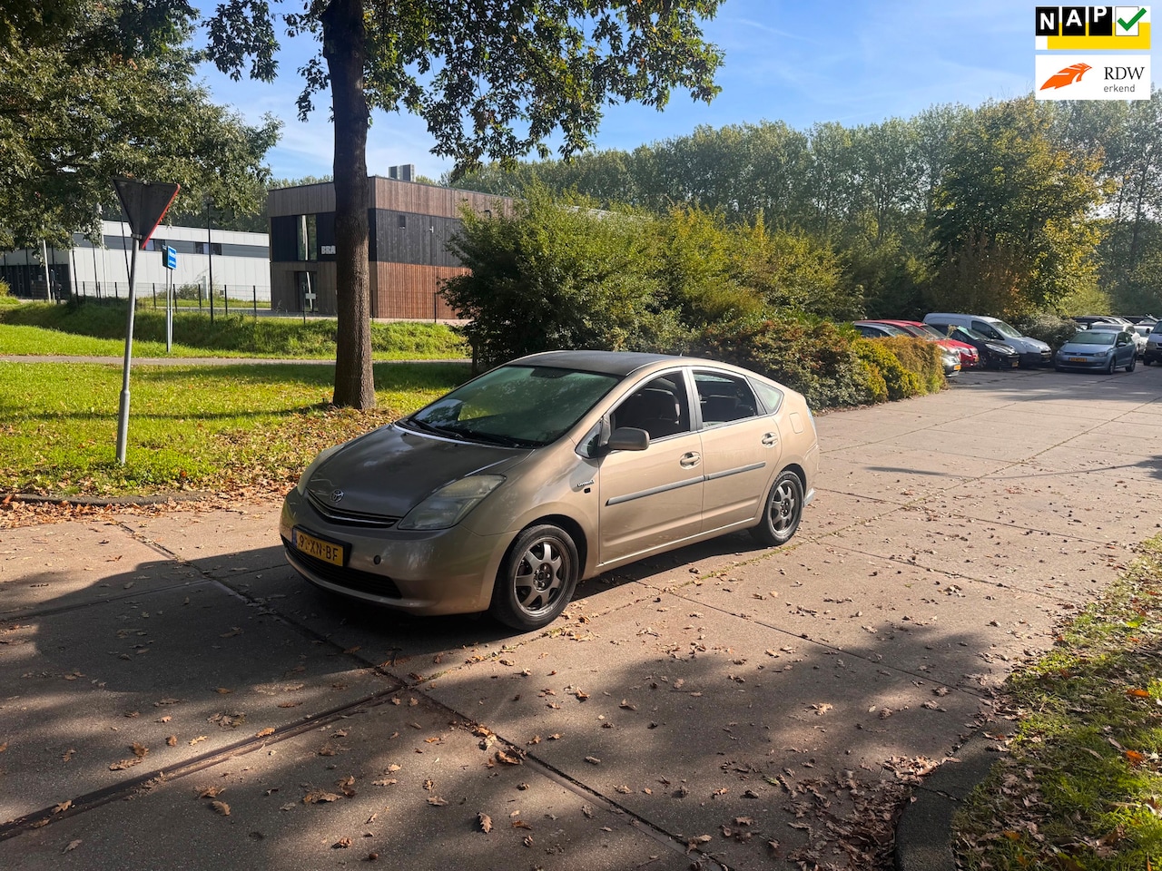 Toyota Prius - 1.5 VVT-i Comfort Clima.Navi - AutoWereld.nl
