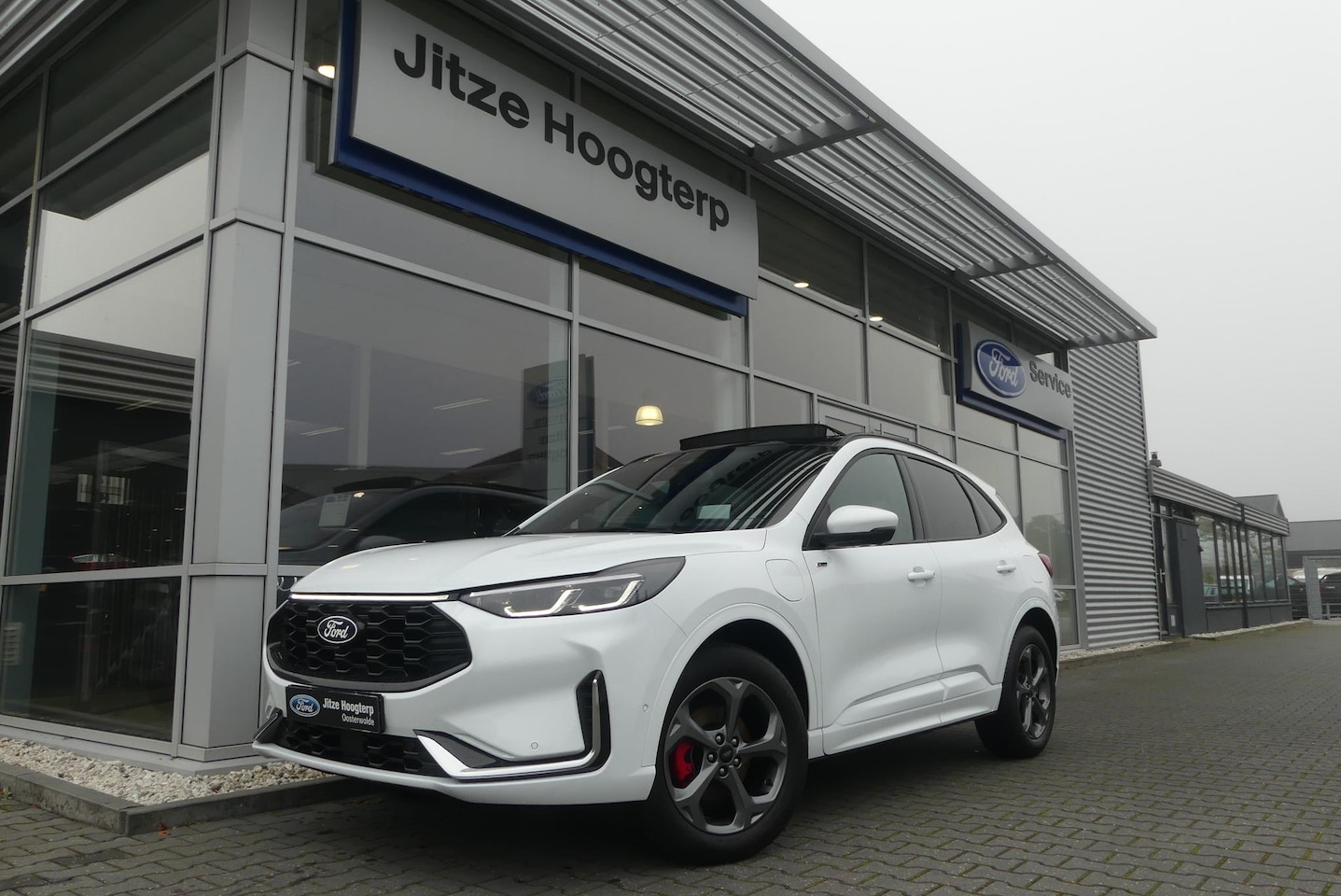 Ford Kuga - 2.5 PHEV ST-Line X PANO, HUD, AGR, MEMORY, 360° CAMERA, WINTER PACK, ADAPT. CRUISE, CLIMA, - AutoWereld.nl