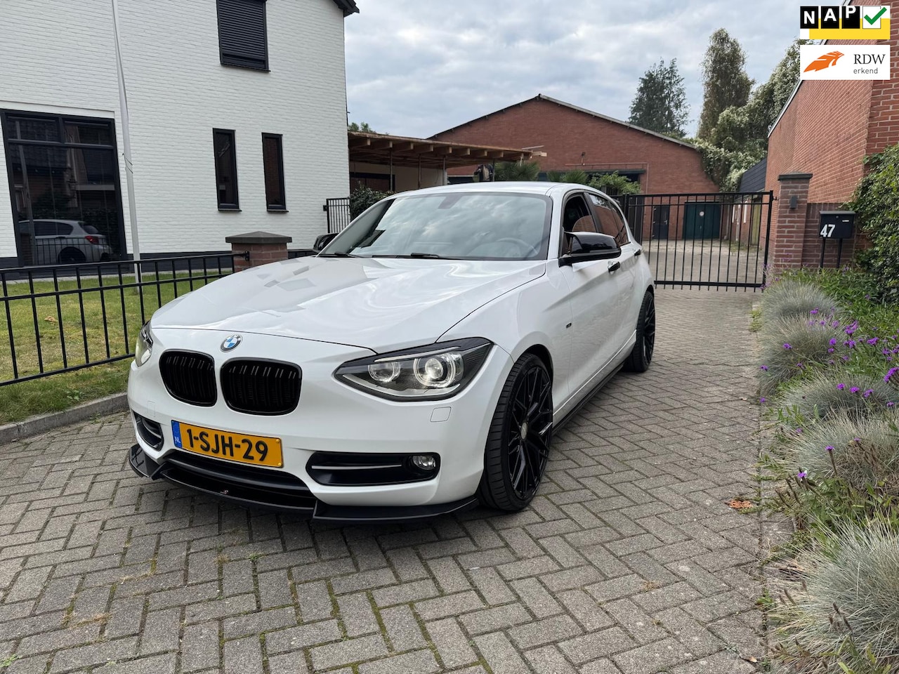 BMW 1-serie - 116i EDE High Executive Leder Navi Cruise Xenon - AutoWereld.nl