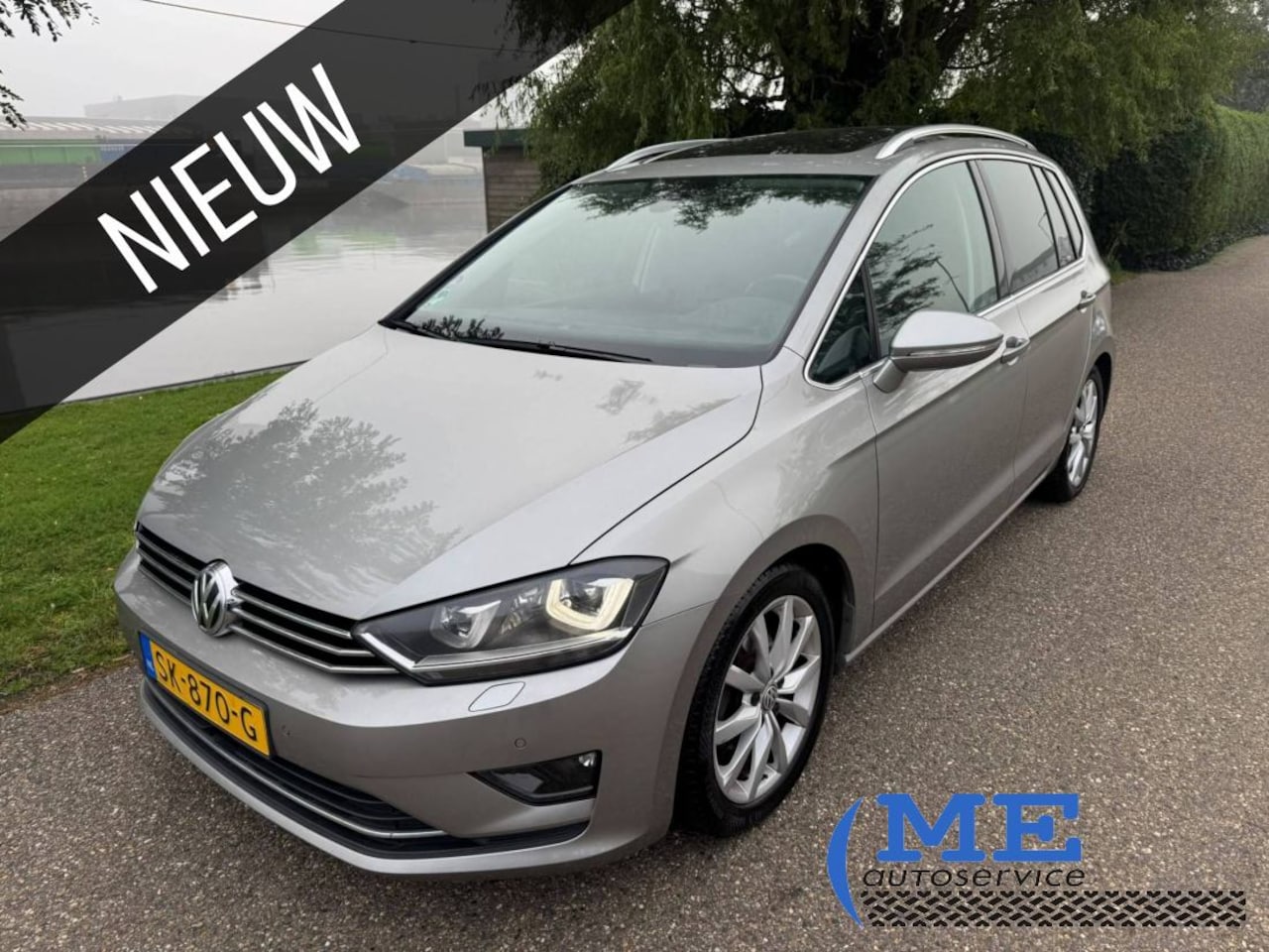 Volkswagen Golf Sportsvan - 1.4 TSI Highline|pano|dsg|stoelverwarming|trekhaak - AutoWereld.nl