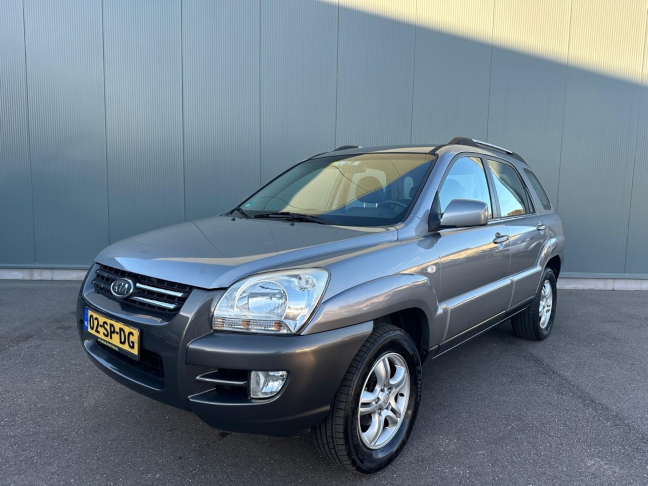 Kia Sportage - 2.0 CVVT Executive HALF LEDE | AIRCO ! - AutoWereld.nl