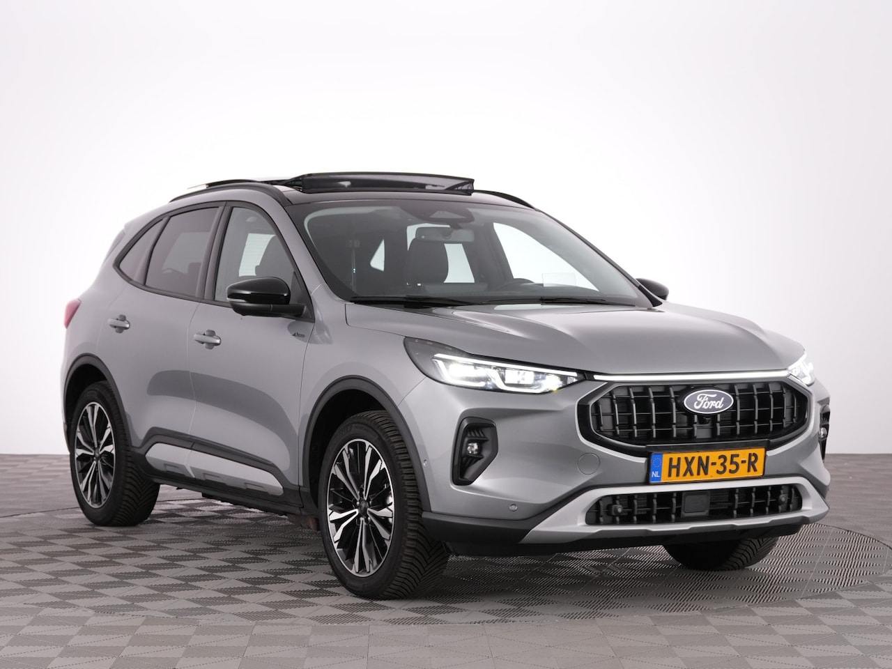 Ford Kuga - 2.5 PHEV Active X | PANORAMADAK | Trekhaak | Head-UP | Half LEDER | B&O | 360 Camera - AutoWereld.nl