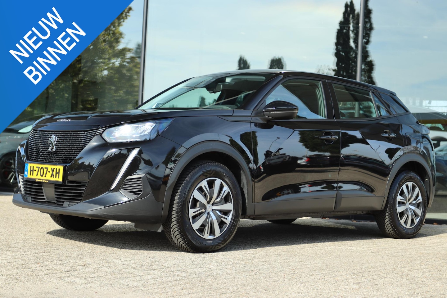 Peugeot 2008 - 1.2 PT ACTIVE | CARPLAY | TREKHAAK |NAVI | PDC | CLIMATE | CRUISE - AutoWereld.nl