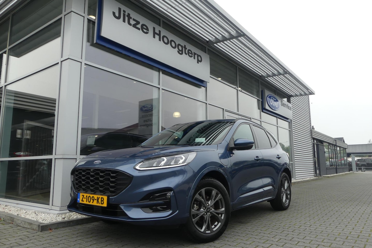 Ford Kuga - 2.5 PHEV ST-Line X ELEKT. TREKHAAK, HUD, WINTER PACK, ADAPT. CRUISE, CLIMA, NAVI, CAMERA V - AutoWereld.nl