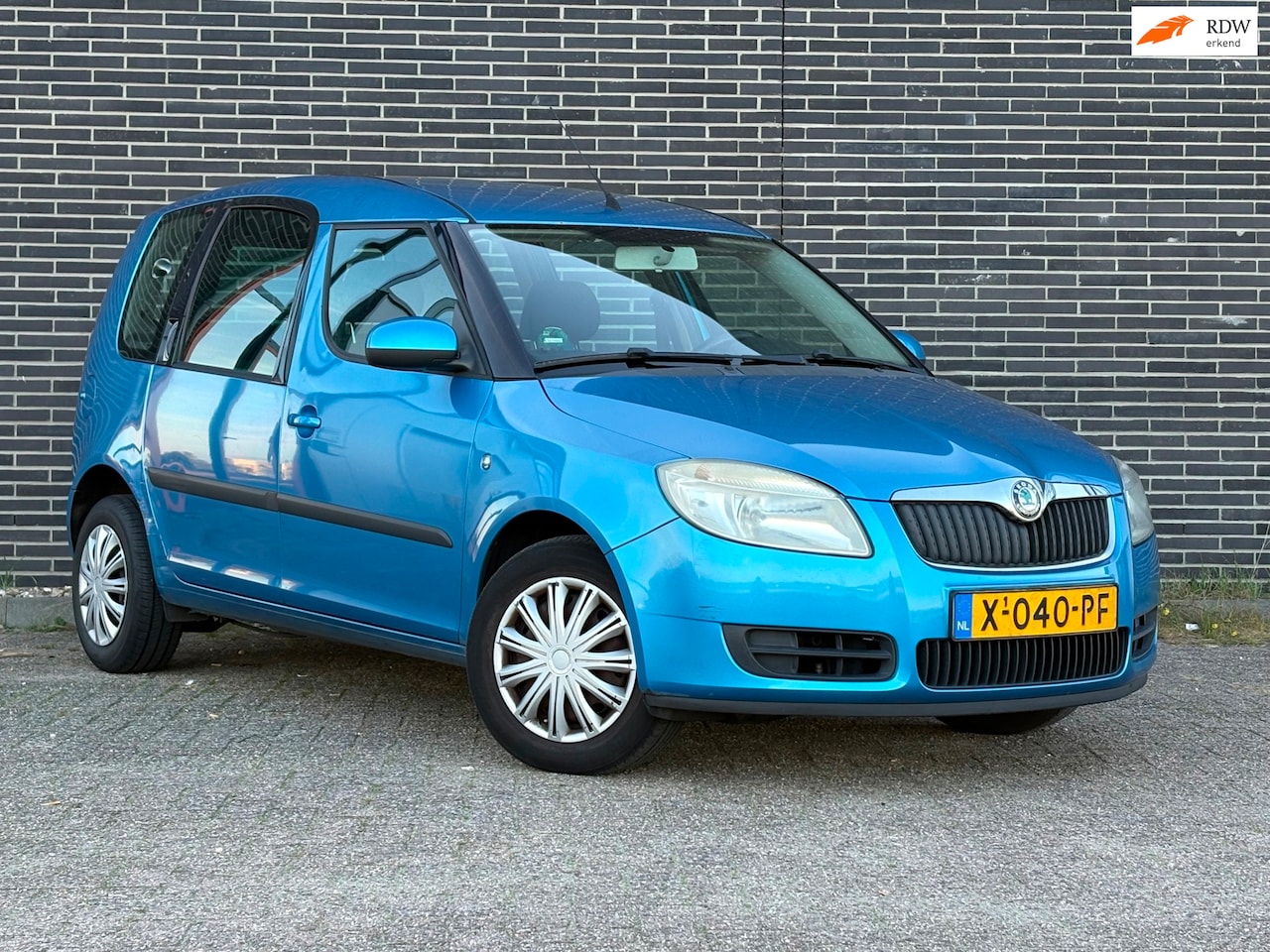 Skoda Roomster - 1.2 Style Airco, Apk! - AutoWereld.nl