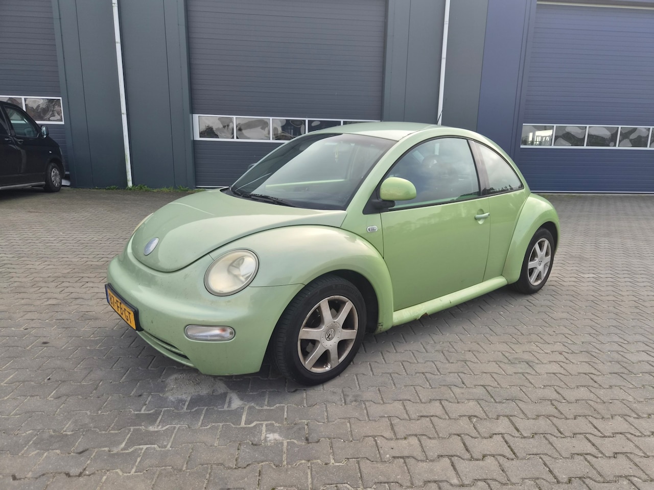 Volkswagen New Beetle - 2.0 Highline Airco - AutoWereld.nl
