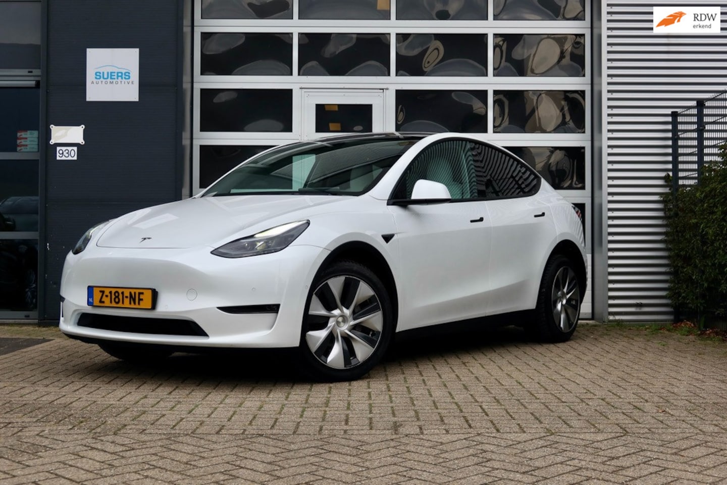 Tesla Model Y - Long Range AWD 75 kWh/ SOH 90% - AutoWereld.nl
