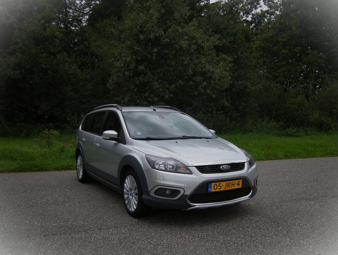Ford Focus Wagon - 1.8 Titanium Flexi Fuel . Navi . Airco . PDC . Trekhaak . enz - AutoWereld.nl