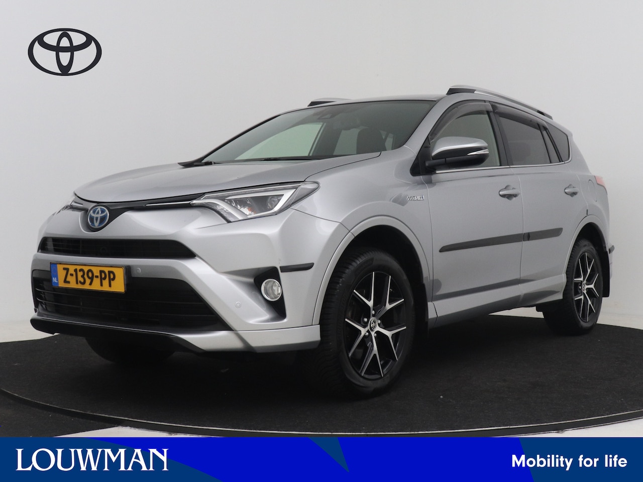 Toyota RAV4 - 2.5 Hybrid AWD Style | Dealer onderhouden | Rood Leder | Stoelverwarming | Navigatie | Cli - AutoWereld.nl