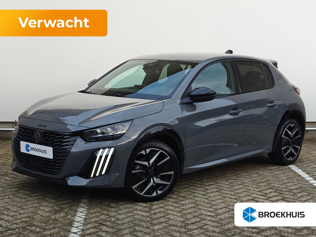 Peugeot 208 - GT | Armsteunen op de voorportieren bekleed met kunstleder met groen sierstiksel (GT-Line) - AutoWereld.nl