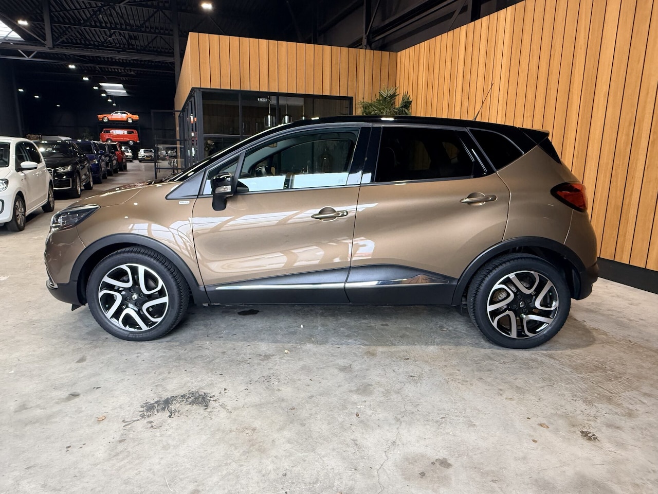 Renault Captur - 1.2 TCe Barista Edition - AutoWereld.nl