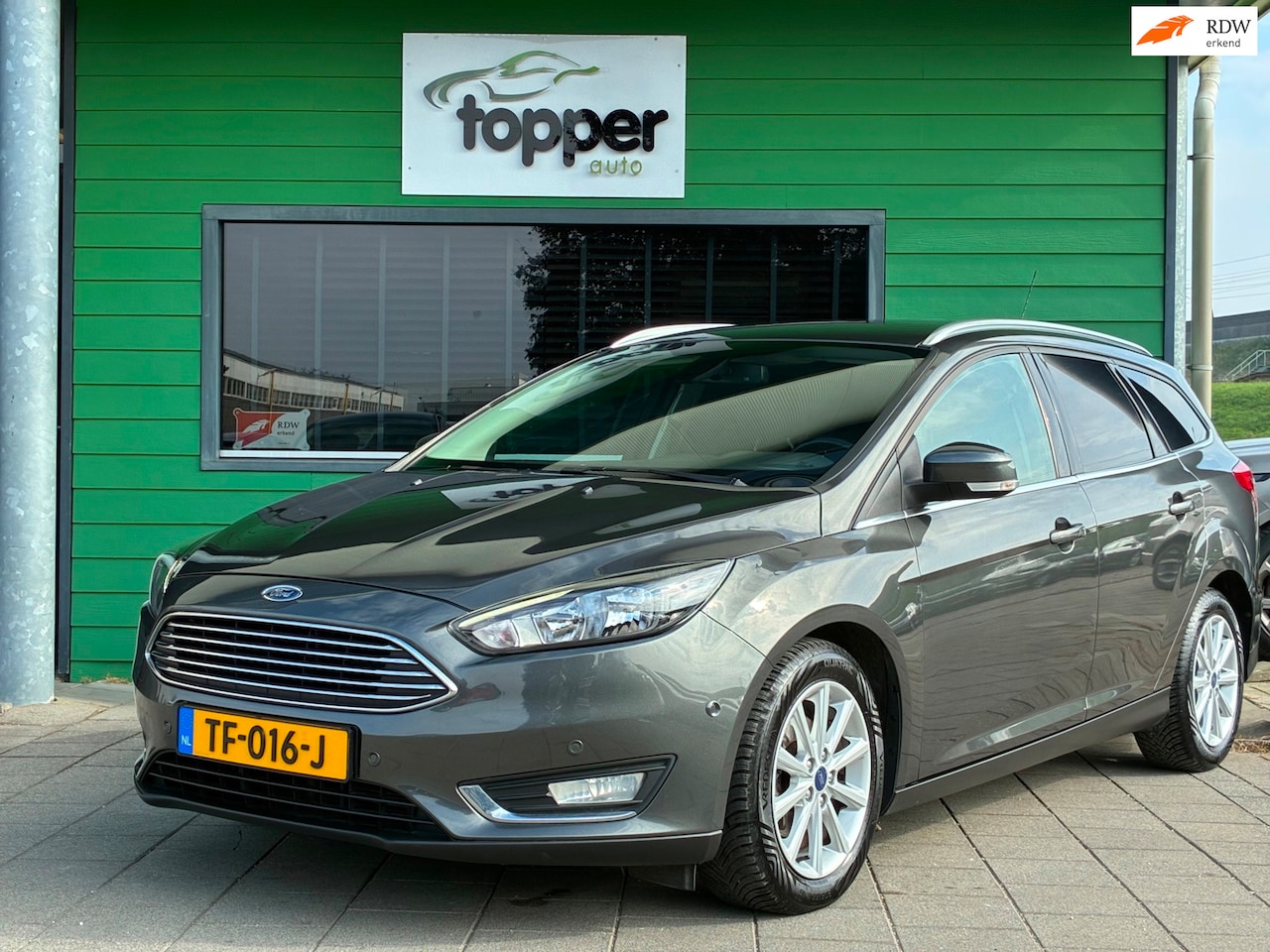 Ford Focus Wagon - 1.0 Titanium|Automaat|D-riem v.v.|Navigatie|Climatronic|CruiseControl|PDC|Trekhaak| - AutoWereld.nl
