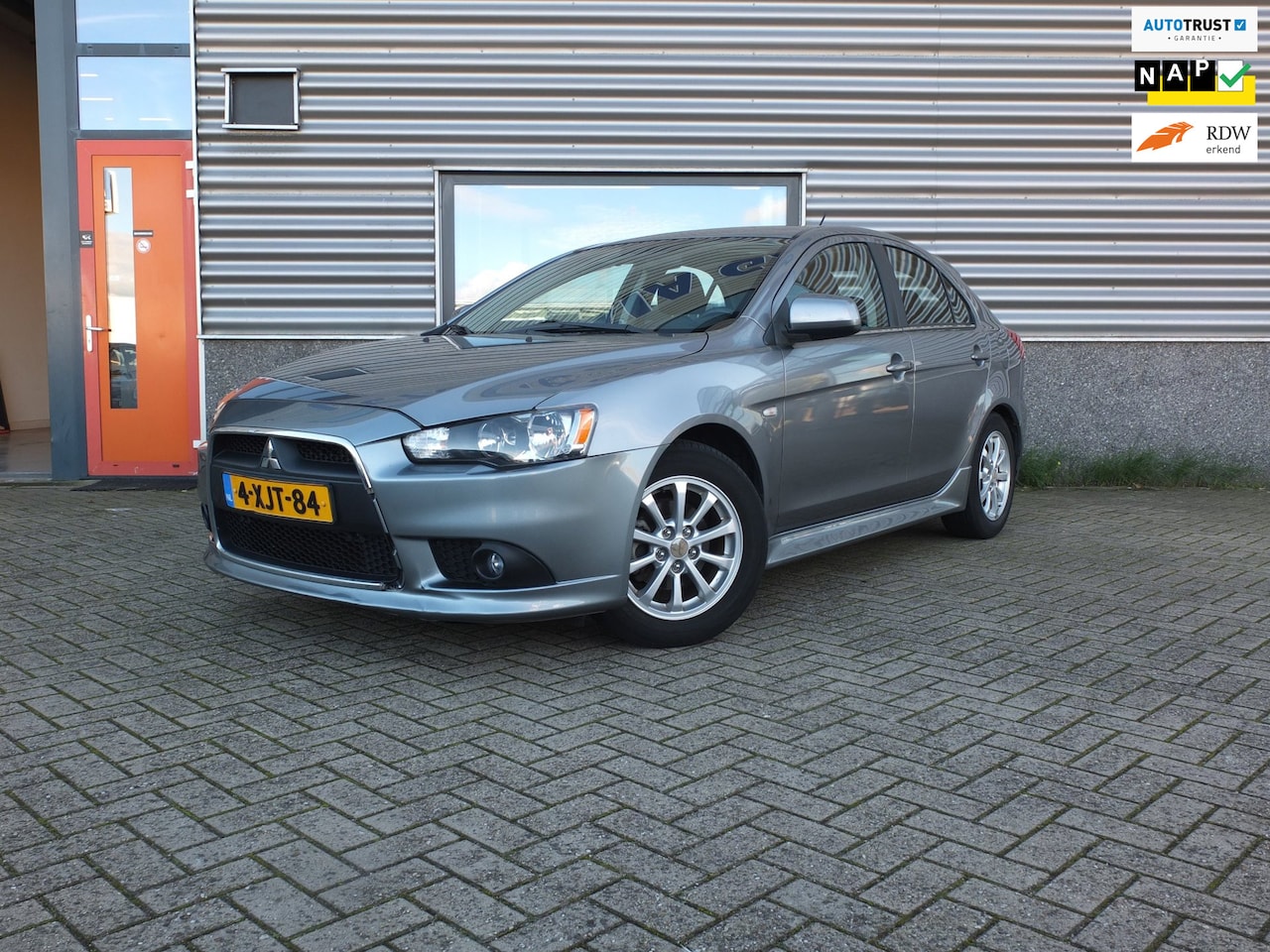 Mitsubishi Lancer Sportback - 1.6 Limited Edition | 103.680 KM | PDC | Airco - AutoWereld.nl