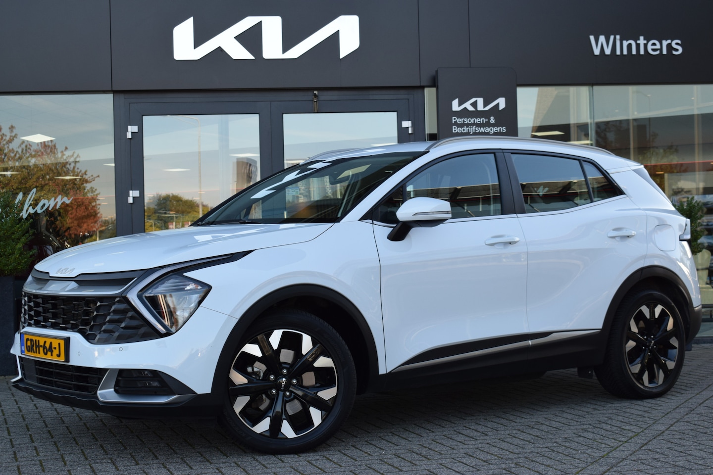 Kia Sportage - 1.6 T-GDi Plug-in Hybrid AWD DynamicLine | Apple Carplay & Android Auto | Camera | Adaptiv - AutoWereld.nl