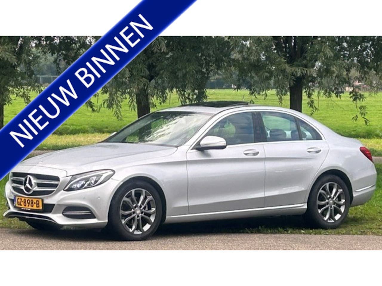 Mercedes-Benz C-klasse - 180 AMBITION AUTOMAAT NAVIGATIE, STOELVERWARMING, SFEERVERLICHTING, SCHUIF/KANTELDAK, PARK - AutoWereld.nl