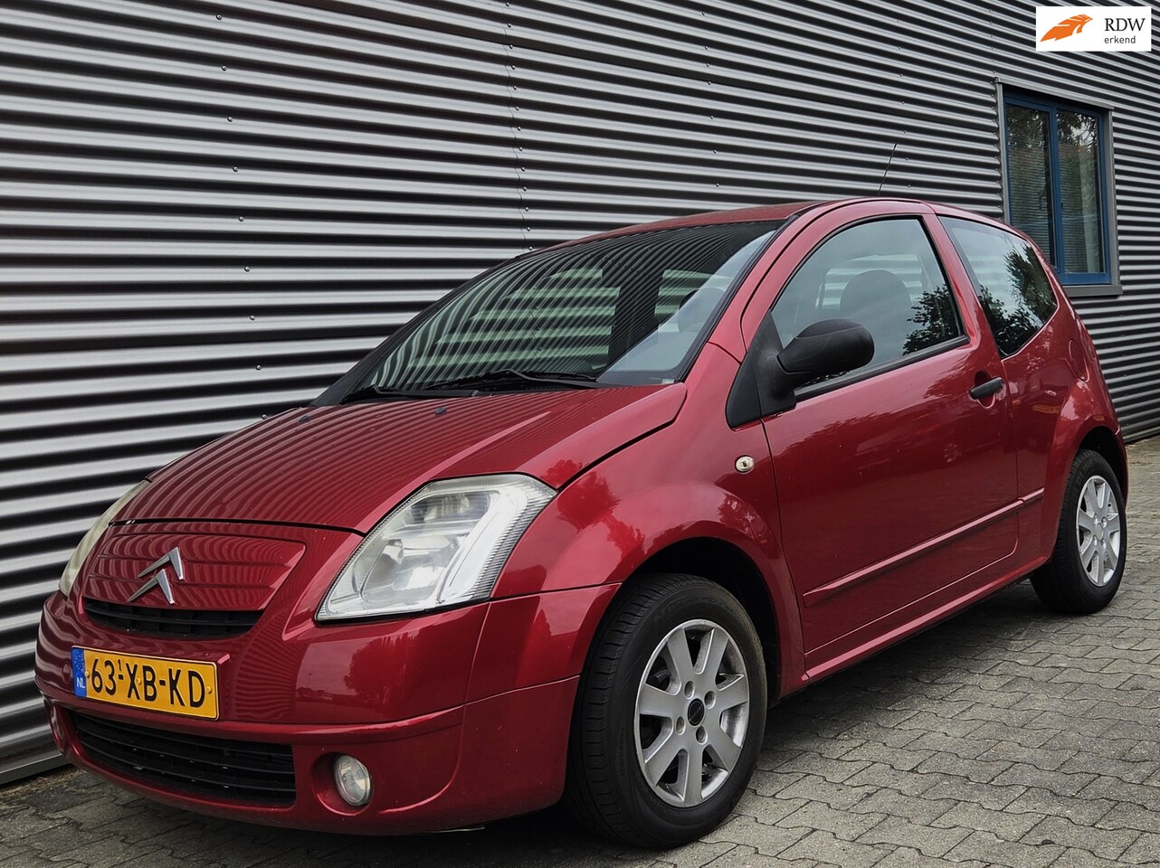 Citroën C2 - 1.4i Plaisir 06-2005 Bord. Rood Metallic - AutoWereld.nl