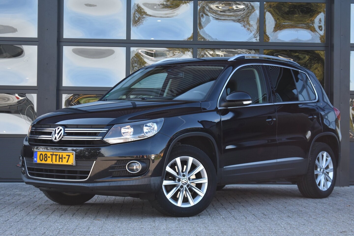 Volkswagen Tiguan - 1.4 TSI Sport&Style '12 Navi Clima Cruise - AutoWereld.nl