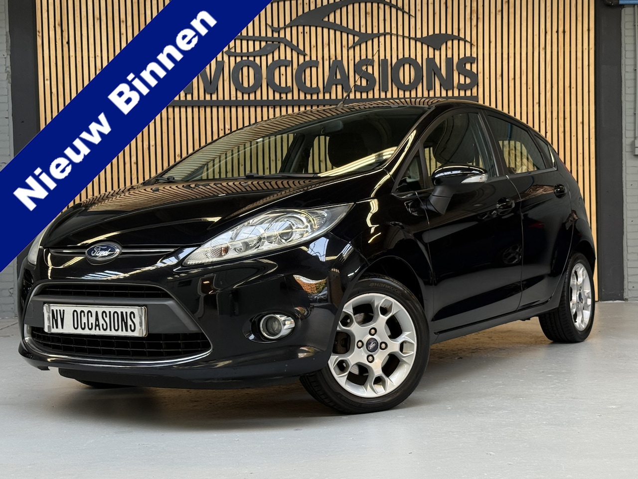 Ford Fiesta - 1.25 Titanium 1E EIGENAAR/DEALEROH/AIRCO/15"LV/NAP/ELEKR/ISOFIX! - AutoWereld.nl