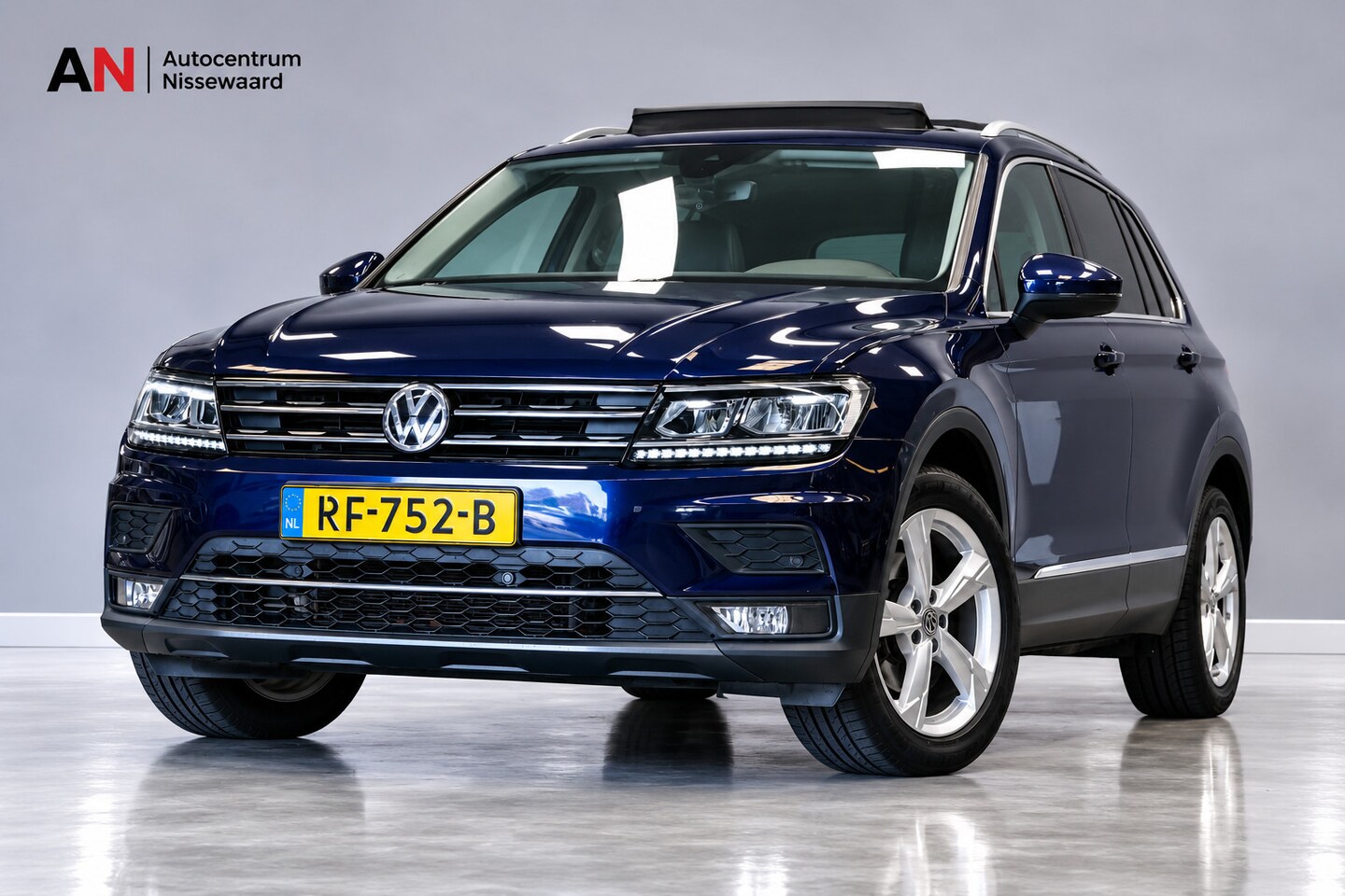 Volkswagen Tiguan - 1.4 TSI ACT Highline|Pano|Carplay|Memory - AutoWereld.nl
