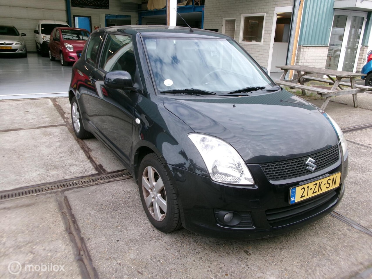 Suzuki Swift - 1.3 Comfort Airco . - AutoWereld.nl