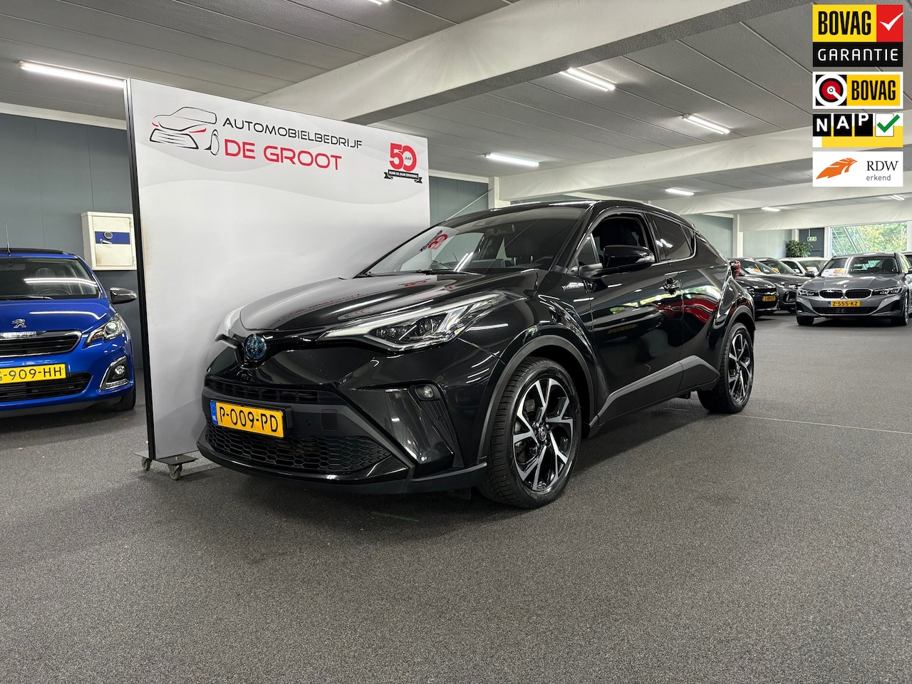 Toyota C-HR - 2.0 Hybrid Style Luxury/ NL auto/ Eerste eigenaar/ BTW auto/ Lederen bekleding - AutoWereld.nl