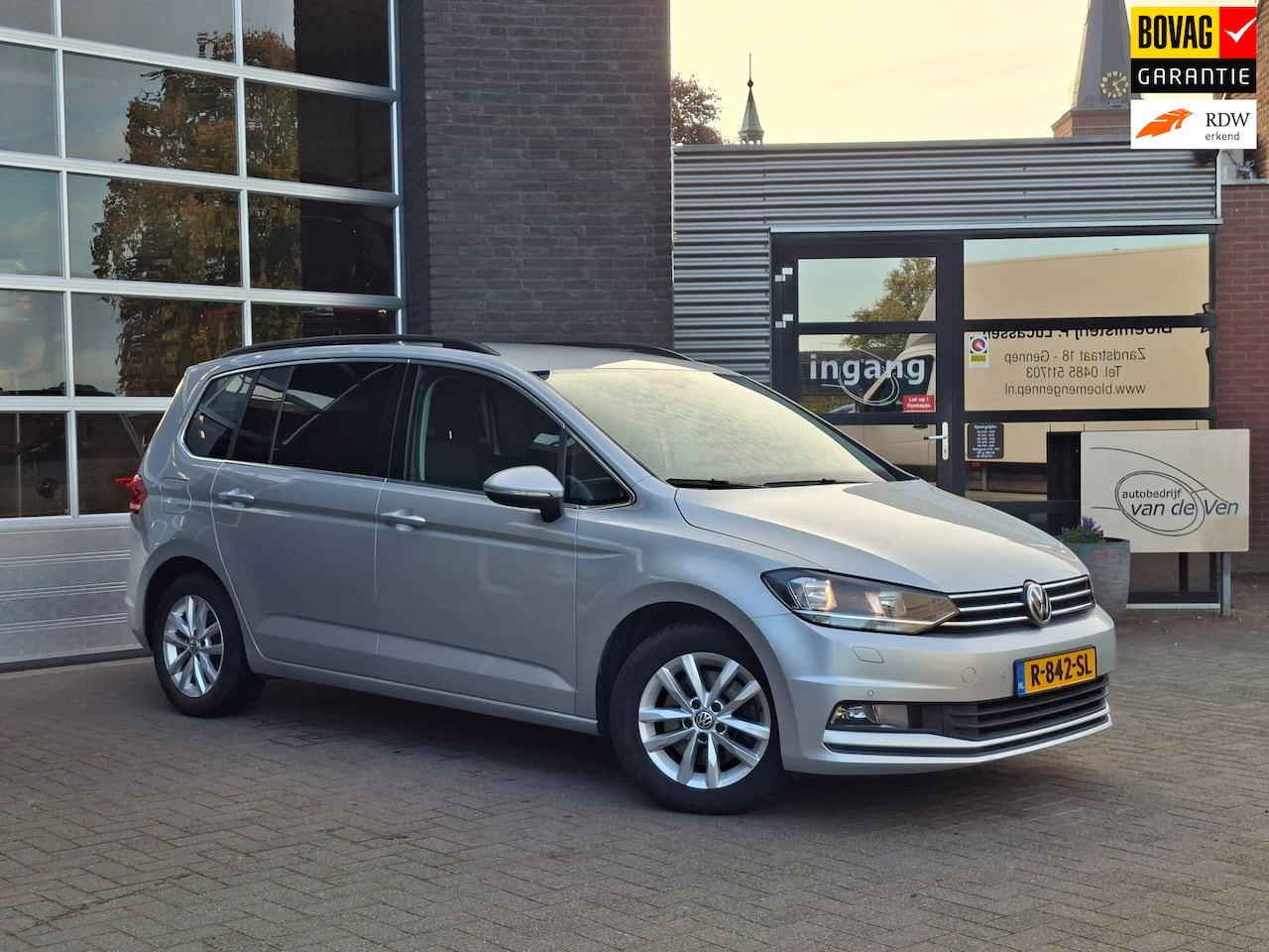 Volkswagen Touran - 1.4 TSI Highline 7p | Trekhaak | Achteruitrij Camera | Voor + Achter parkeersensoren|Stoel - AutoWereld.nl