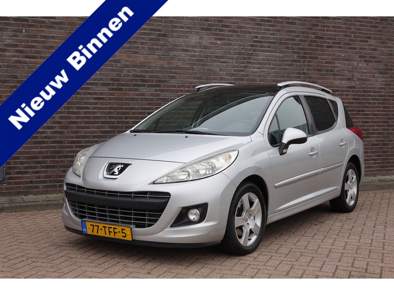 Peugeot 207 SW - 1.6 VTi Allure 1.6 VTi Allure, airco, leder, panoramadak, allseason banden, keurige auto - AutoWereld.nl