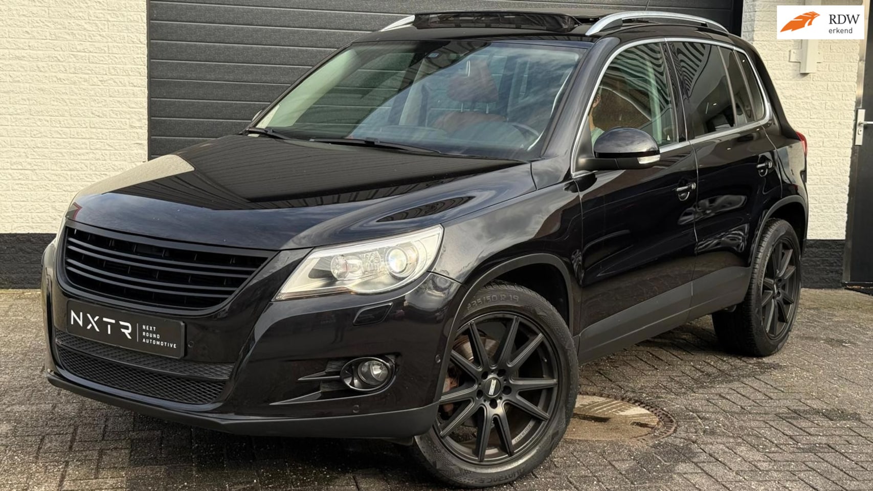Volkswagen Tiguan - 2.0 TSI Sport&Style 4Motion | Pano | Leder | Camera | Navi | Stoelverwarming - AutoWereld.nl