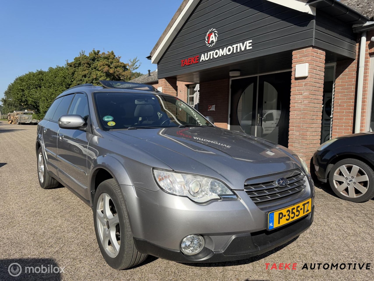 Subaru Legacy Touring Wagon - 2.5i Exclusive Edition AUT/DAKJE - AutoWereld.nl