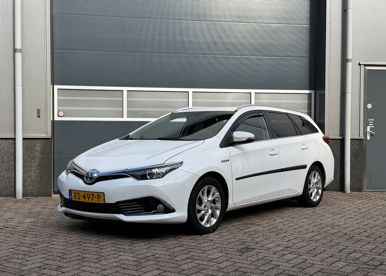 Toyota Auris Touring Sports - 1.8 Hybrid Aspiration bj.2015 Camera|Navi|Clima. - AutoWereld.nl