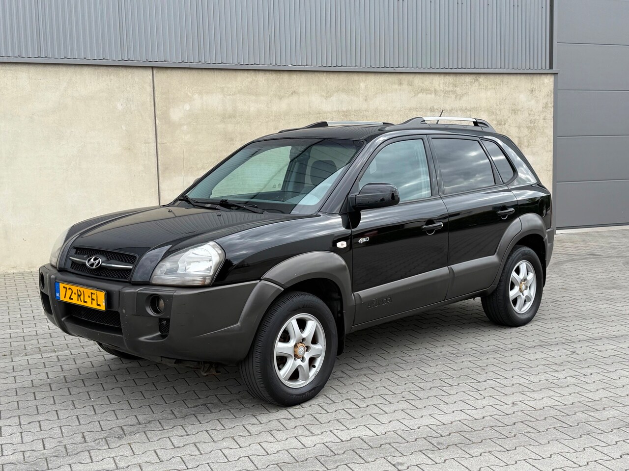 Hyundai Tucson - 2.7i V6 4WD Style AUTOMAAT+CLIMATE AIRCO+LEDER+CRUISE CONTROL+TREKHAAK - AutoWereld.nl