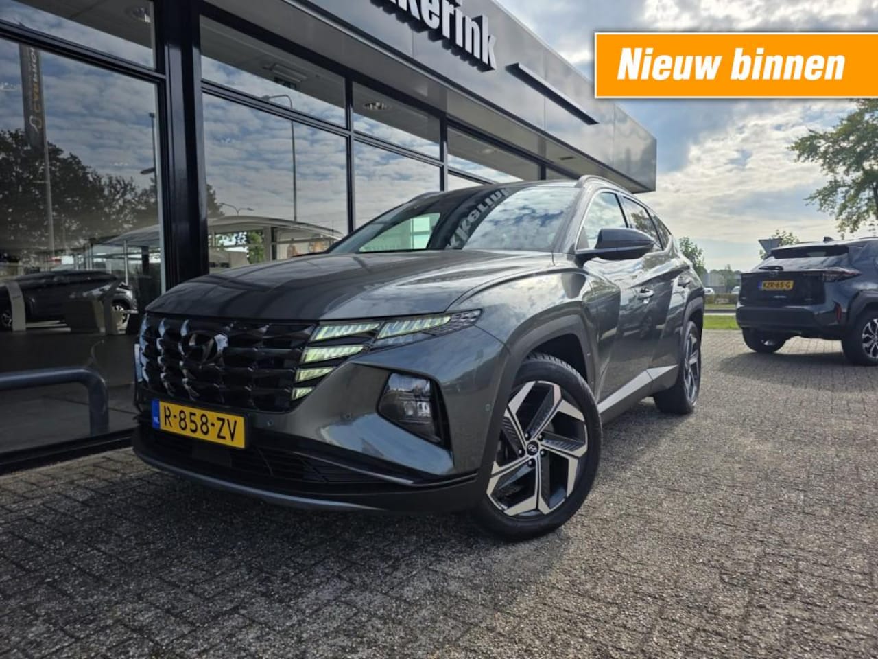 Hyundai Tucson - 1.6 T-GDI HEV PREMIUM ADAPTIVE/GEHEUGEN/360/STOELKOELING - AutoWereld.nl