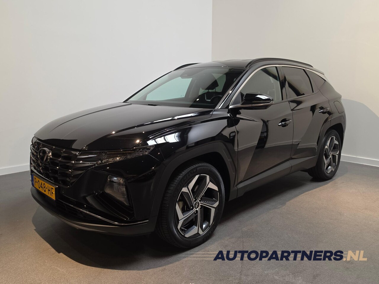 Hyundai Tucson - 1.6 T-GDI PHEV Premium 4WD *Full option* Stoelverwarming voor en achter - Stoelventilatie - AutoWereld.nl