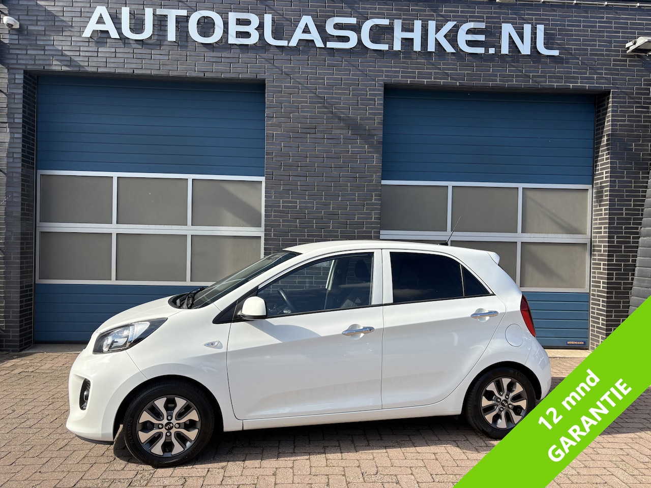 Kia Picanto - 1.0 CVVT ComfortPlusLine Navigator 1.0 CVVT ComfortPlusLine Navigator, climate/cruise/navi - AutoWereld.nl