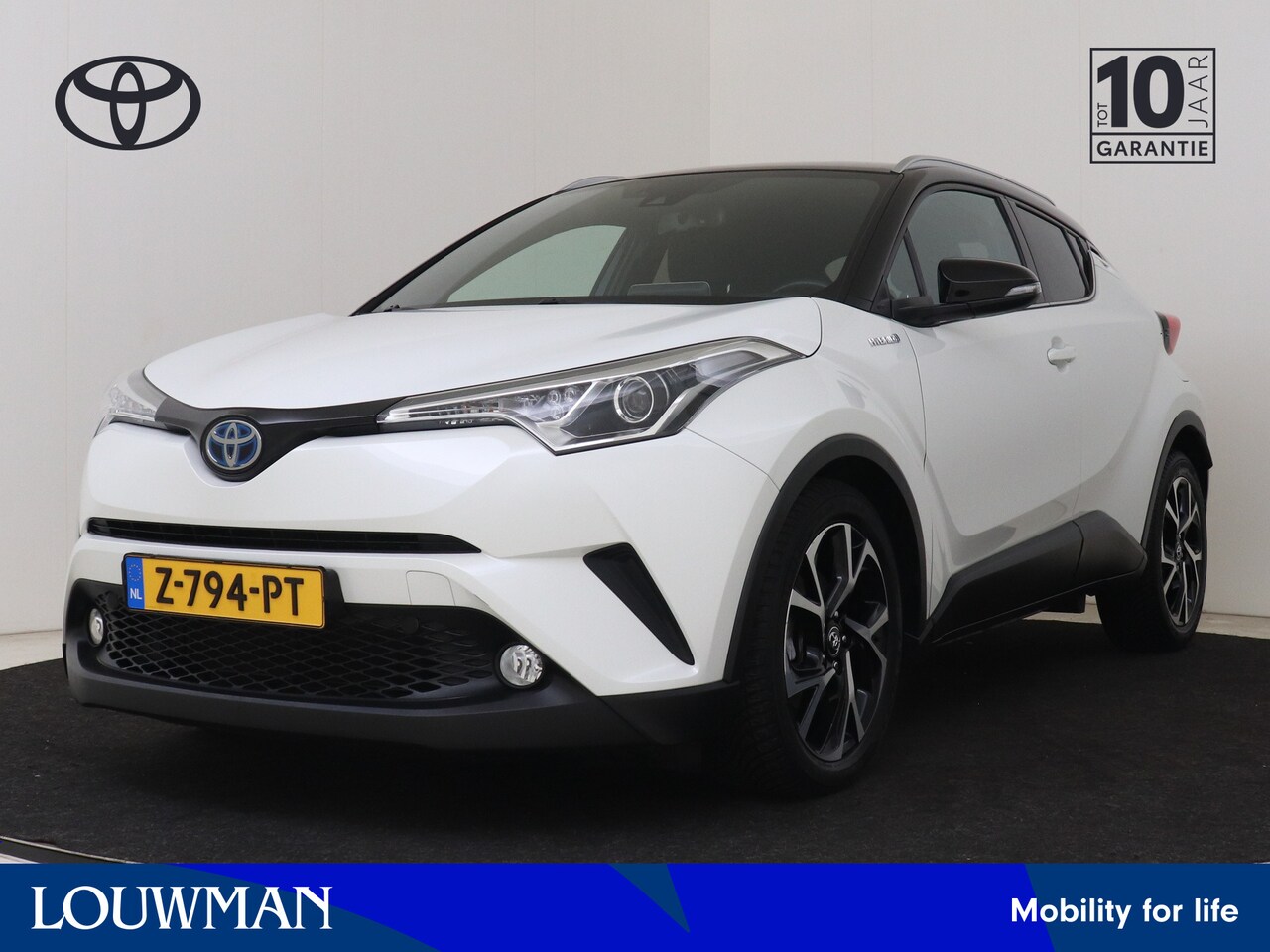Toyota C-HR - 1.8 Hybrid Style Bi-Tone | Navigatie | Stoelverwarming | Climate Control | Cruise Control - AutoWereld.nl