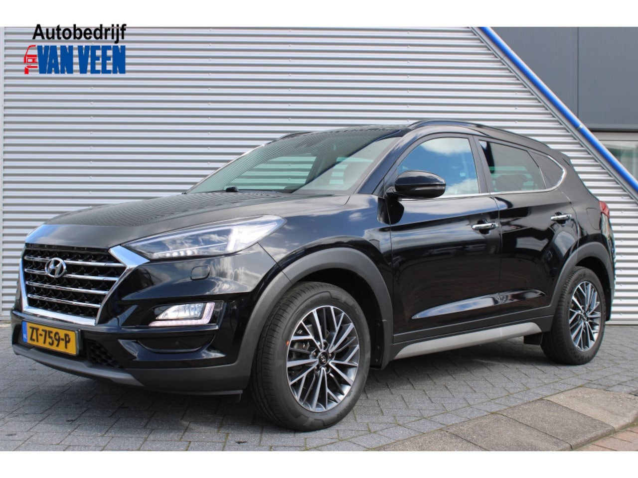 Hyundai Tucson - 1.6 T-GDI Premium Automaat | Trekhaak | Navi | Camera - AutoWereld.nl