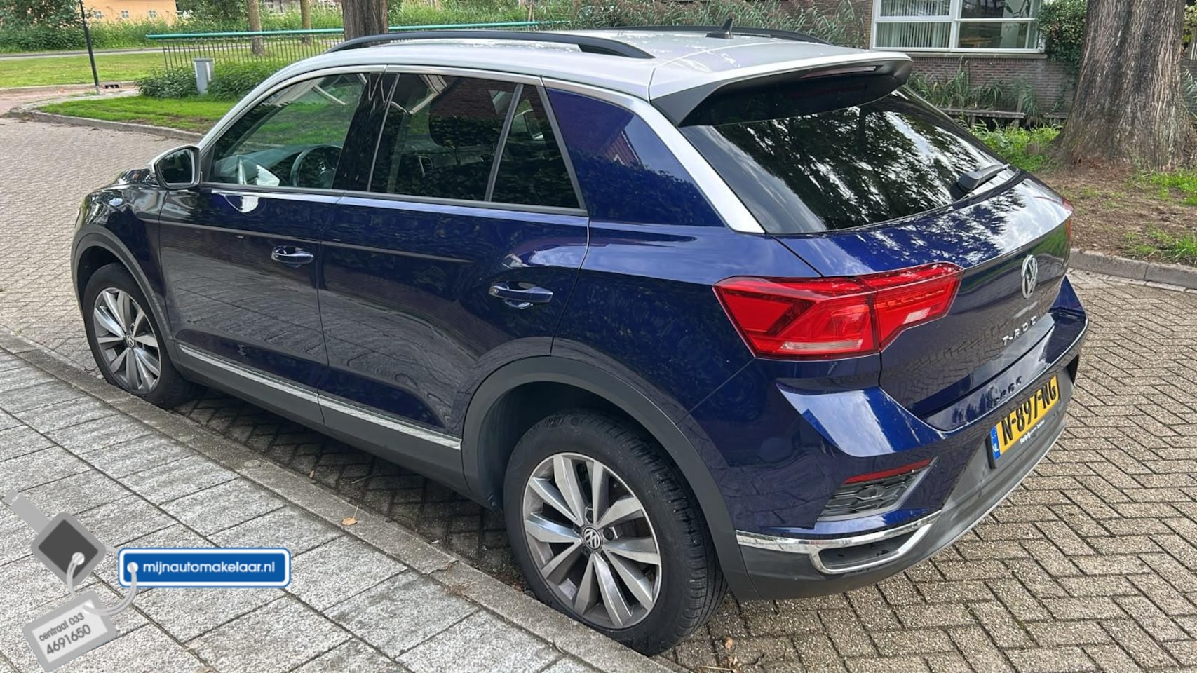 Volkswagen T-Roc - 1.5 TSI Sport ACC Carplay - AutoWereld.nl