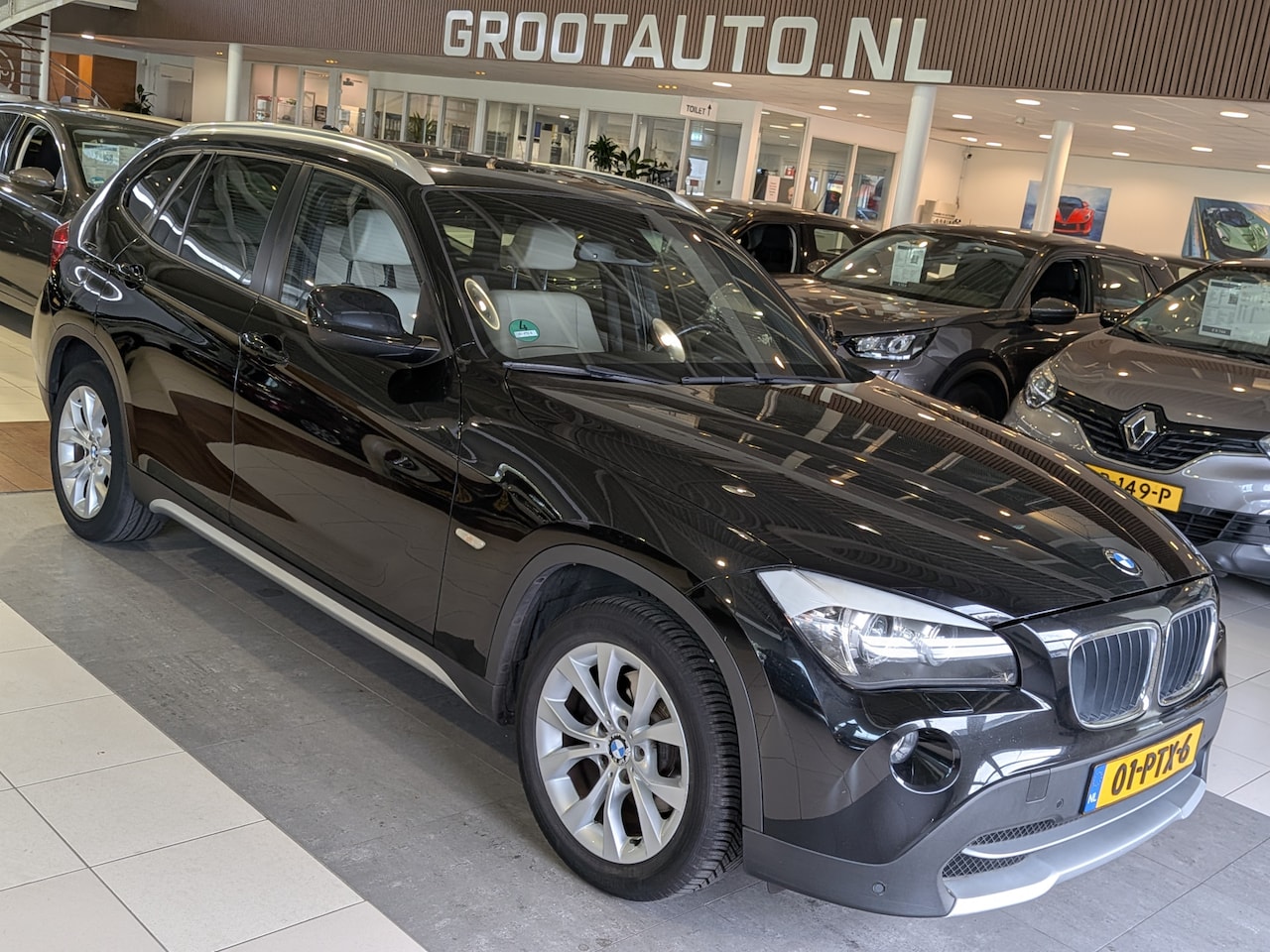 BMW X1 - sDrive18i Automaat Panoramadak, Airco, Trekhaak, Stuurbekrachtiging - AutoWereld.nl