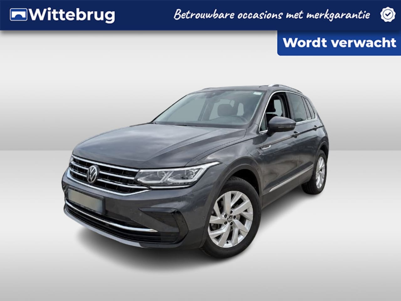 Volkswagen Tiguan - 1.4 TSI eHybrid 245PK Elegance / Panoramadak / Zwenkbare Trekhaak / Zwart Leer / Memory Se - AutoWereld.nl