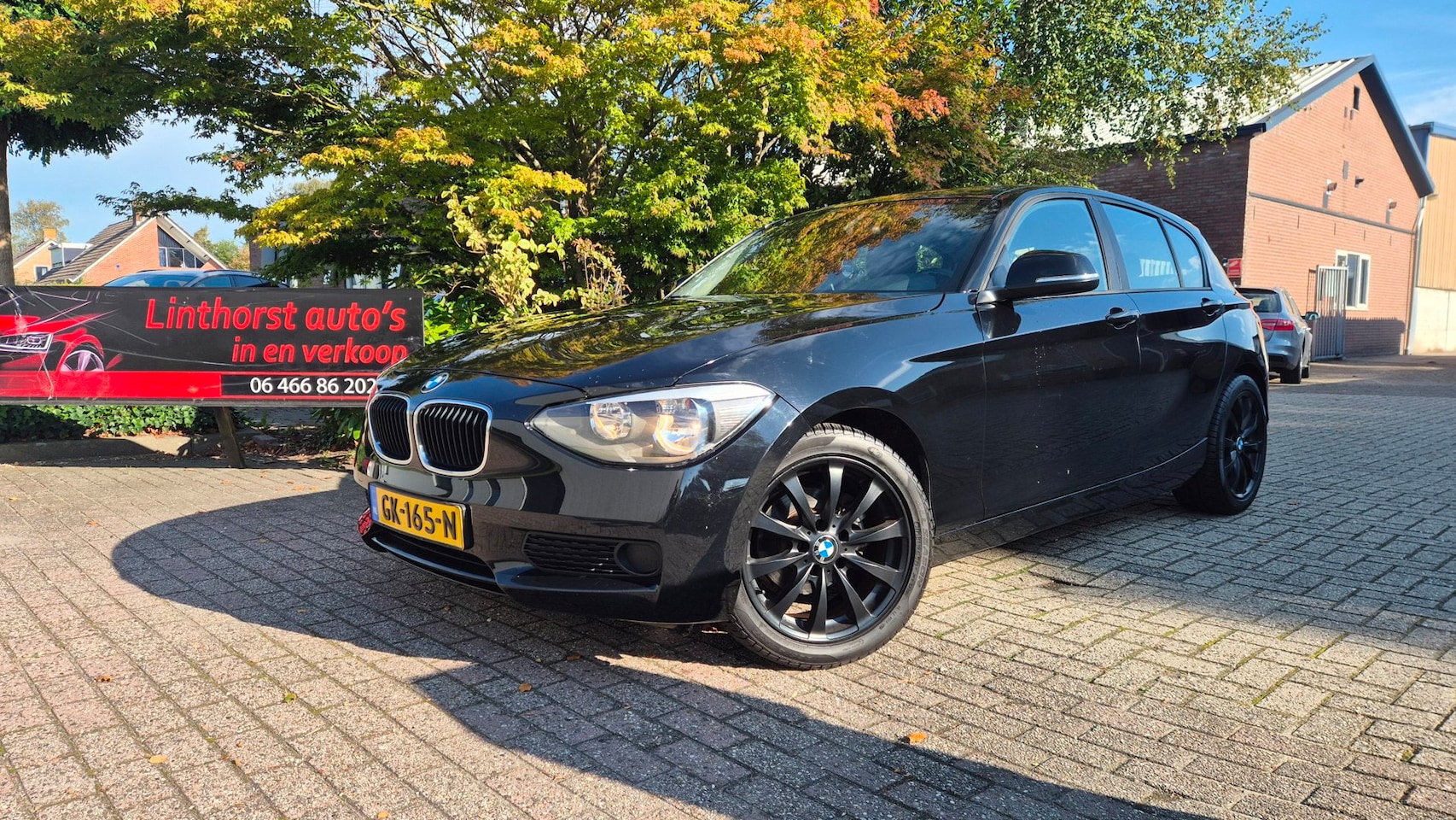BMW 1-serie - 118d Business CLIMA-NAVI-BJ 2013 - AutoWereld.nl
