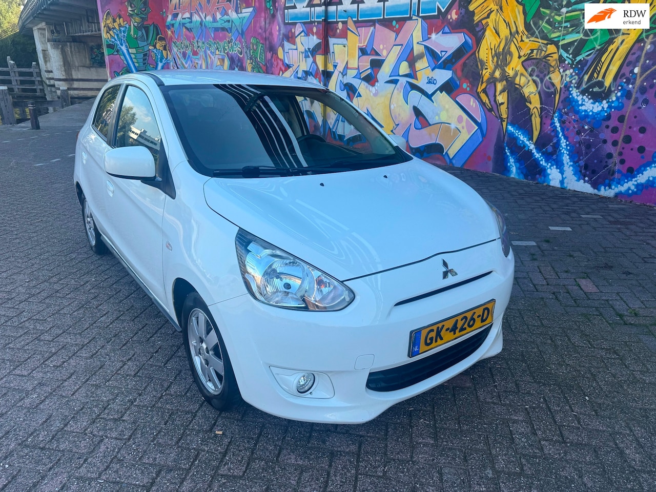Mitsubishi Space Star - 1.0 Bright werkende airco stereo sport velgen fijne ruime auto lekker zuinig rijd heerlijk - AutoWereld.nl
