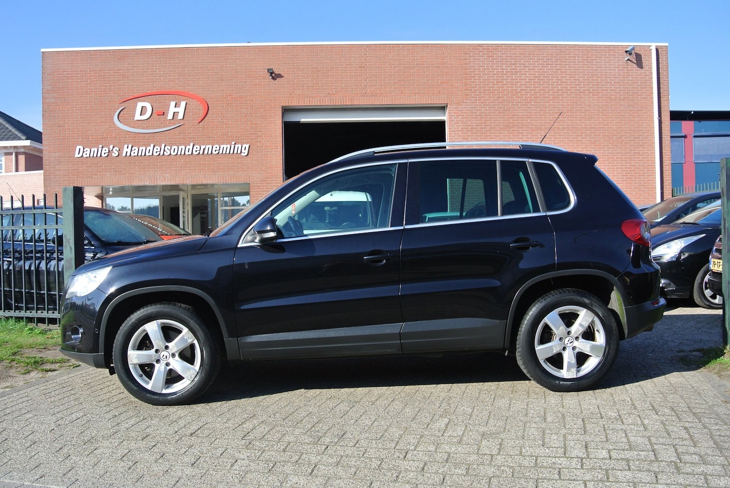 Volkswagen Tiguan - 1.4 TSI Sport&Style airco inruil mogelijk nap - AutoWereld.nl