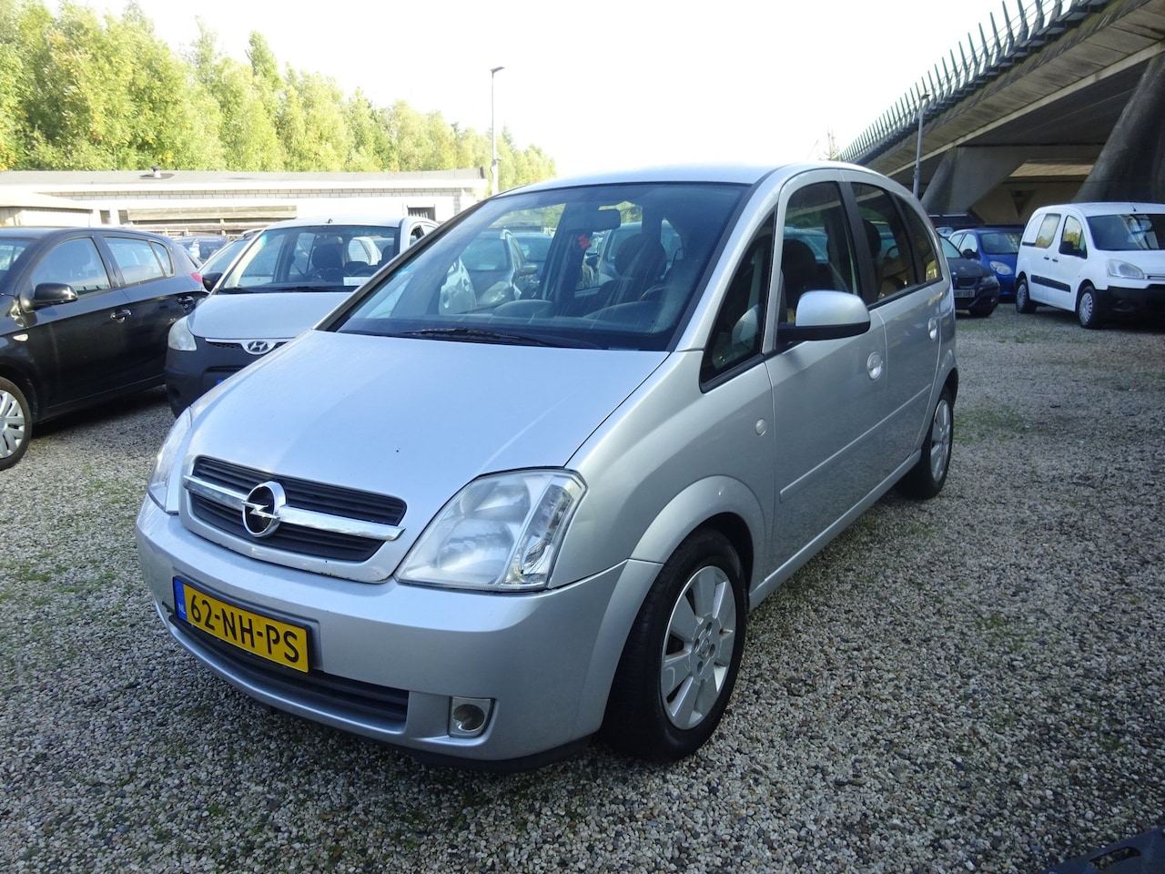 Opel Meriva - 1.6-16V Cosmo. Airco, Cruise control. Navigatie - AutoWereld.nl