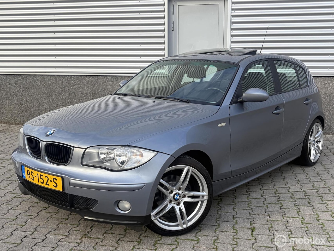 BMW 1-serie - 116i Executive Schuifdak-stoelverwarming - AutoWereld.nl